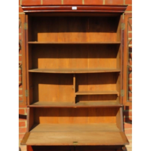 846 - An Edwardian mahogany bureau bookcase, with astral glazed doors, fall front bureau section over one ... 