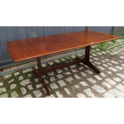 854 - A mid-century teak extending dining table by Vansen, with central folding butterfly leaf, on shaped ... 