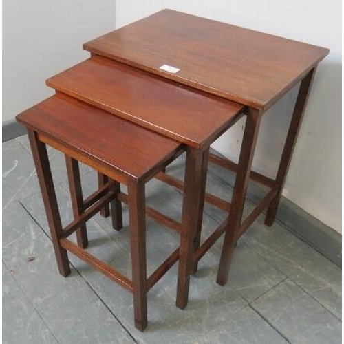 865 - A set of three Edwardian mahogany nesting tables, on square supports with stretchers.
Condition repo... 