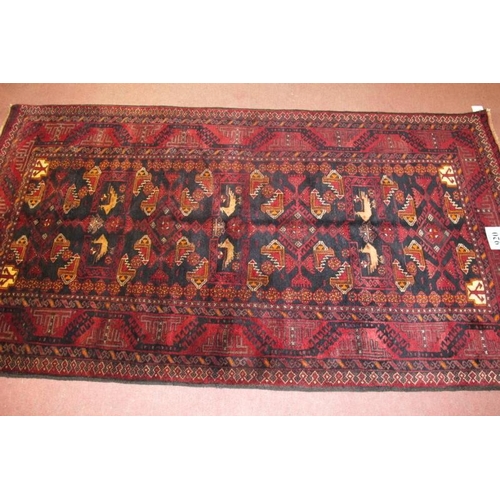 920 - Meshed Belouch rug, a central patterned field with stylised birds, blue/deep red. Good condition and... 