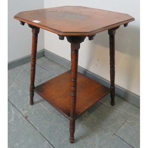 862 - An Edwardian mahogany two tier square occasional table, on canted ring turned supports.
With carved ... 