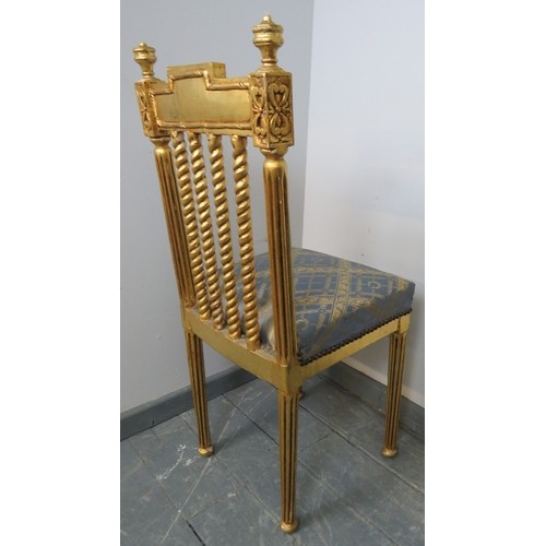 875 - A vintage giltwood opera chair with blue and gold patterned silk upholstery, on reeded supports with... 