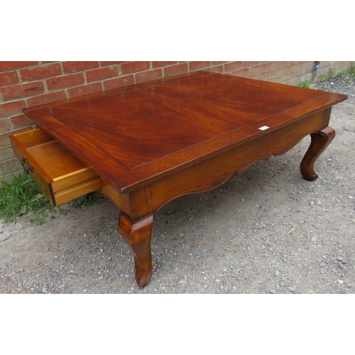 880 - A large period style rectangular French oak coffee table with drawers to either side, on ogee suppor... 