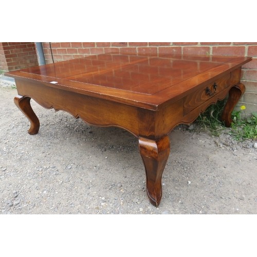 880 - A large period style rectangular French oak coffee table with drawers to either side, on ogee suppor... 