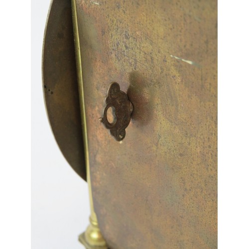 66 - An Antique 17th century style brass lantern clock, engraved 'Dadswell, Burwash', with later oak wall... 