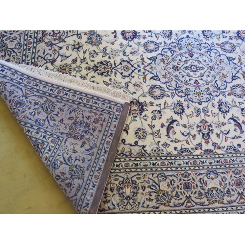 919 - Fine Kashan Persian carpet cream ground. A good quality carpet in clean condition. 300cm x 200cm (ap... 