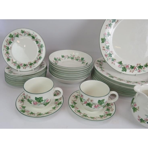 100 - A 39 piece part dinner service of Royal Doulton expressions Tiverton pattern china, including 18 pla... 