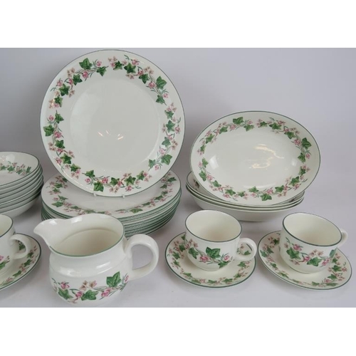 100 - A 39 piece part dinner service of Royal Doulton expressions Tiverton pattern china, including 18 pla... 