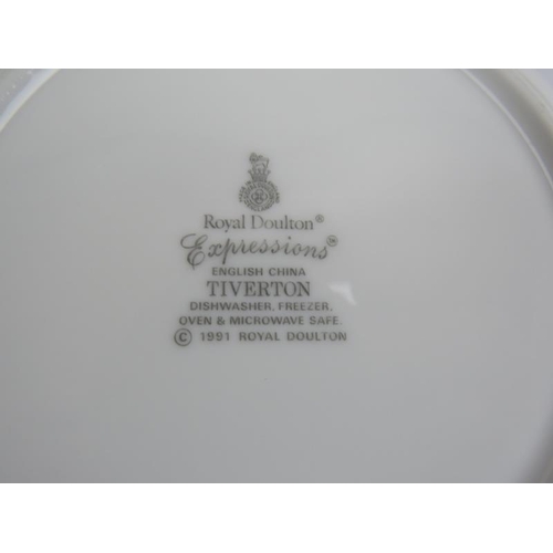 100 - A 39 piece part dinner service of Royal Doulton expressions Tiverton pattern china, including 18 pla... 