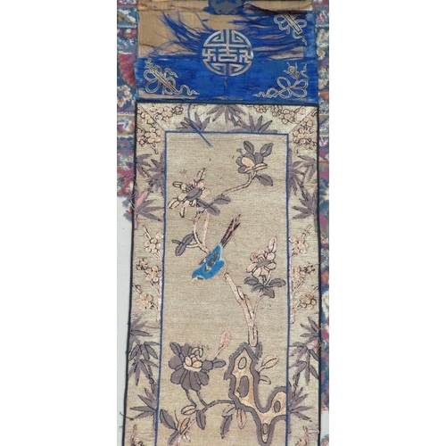 107 - A late 19th century Chinese silk wall hanging depicting a seated sage (170cm x 75cm) and a similar s... 