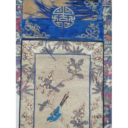 107 - A late 19th century Chinese silk wall hanging depicting a seated sage (170cm x 75cm) and a similar s... 