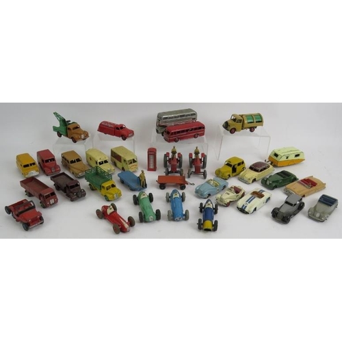 109 - A collection of 33 vintage Die Cast Dinky toys cars, buses, vans, lorries, tractors etc. (33).
Condi... 