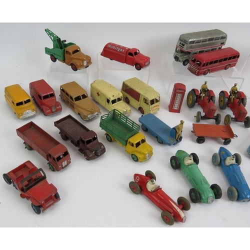 109 - A collection of 33 vintage Die Cast Dinky toys cars, buses, vans, lorries, tractors etc. (33).
Condi... 