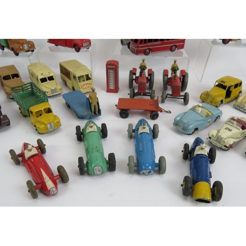 109 - A collection of 33 vintage Die Cast Dinky toys cars, buses, vans, lorries, tractors etc. (33).
Condi... 