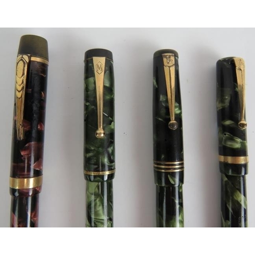 115 - Four vintage marbled fountain pens including a Mentmore auto-flow, an Onoto the pen Delarue & Co Lon... 