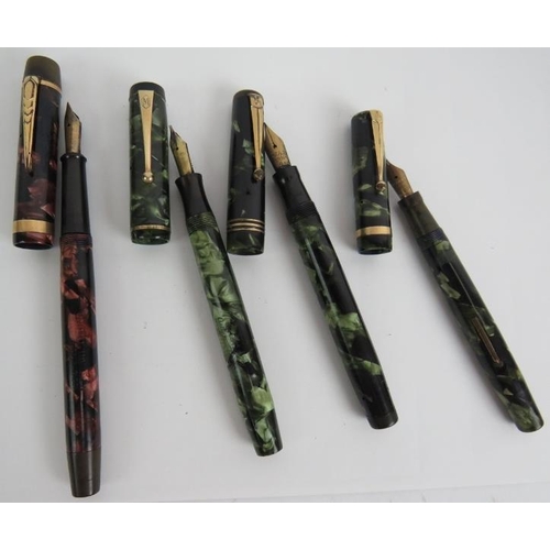 115 - Four vintage marbled fountain pens including a Mentmore auto-flow, an Onoto the pen Delarue & Co Lon... 