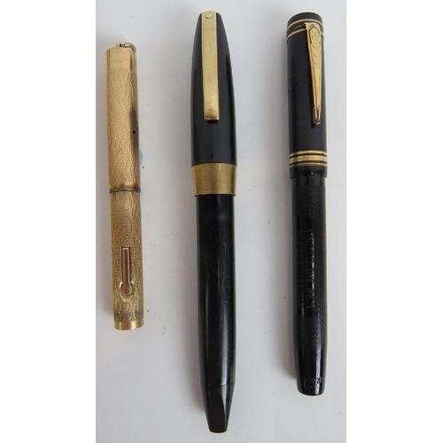 115C - A gold plated Shaeffer fountain pen, a Wahl gold plated small fountain pen, a black Shaeffer fountai... 