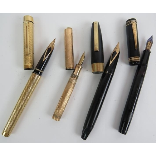 115C - A gold plated Shaeffer fountain pen, a Wahl gold plated small fountain pen, a black Shaeffer fountai... 