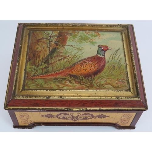 130 - An early Huntley & Palmers biscuit tin with hinged lid featuring relief decoration of a pheasant. 21... 