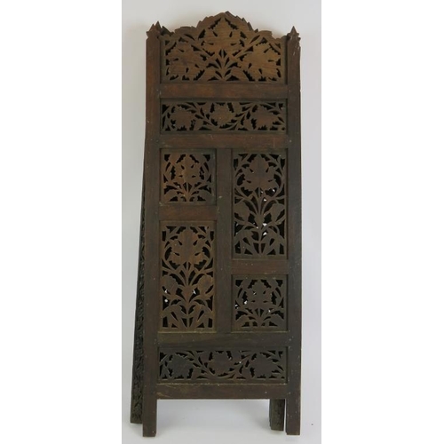 131 - A four panel carved hardwood Indo-Persian screen with intricate grape and vine panels. Height 79cm.
... 