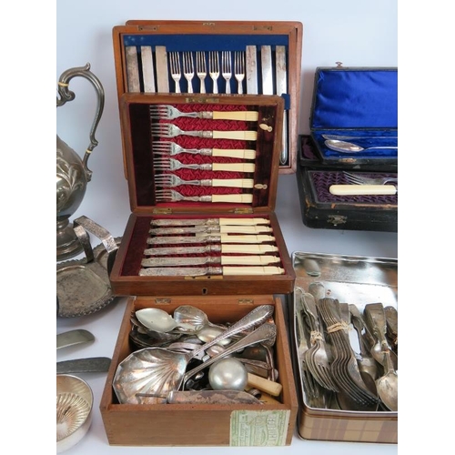 139 - A large quantity of mainly antique silver plated cutlery, much in presentation cases plus a quantity... 