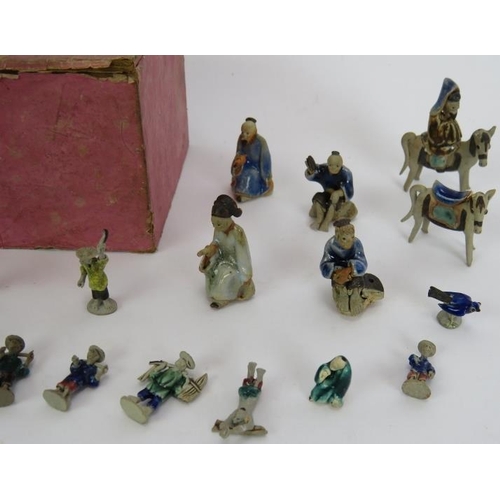 154 - A collection of miniature Chinese ceramic figures of humans and animals, most partly glazed. Tallest... 