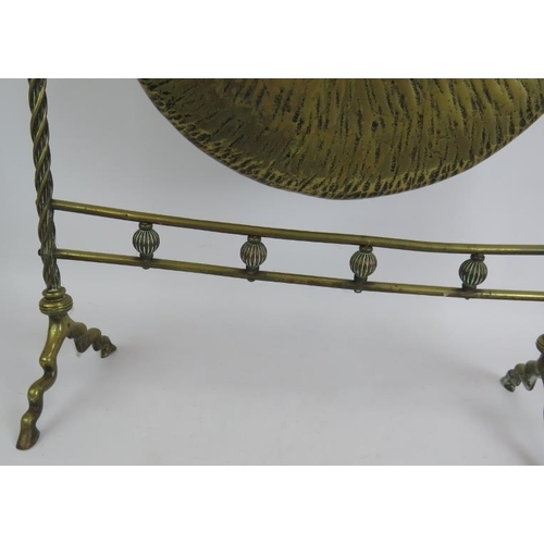 159 - A large antique bass gong on barley twist stand. Height 76cm. Gong diameter 40cm.
Condition report: ... 