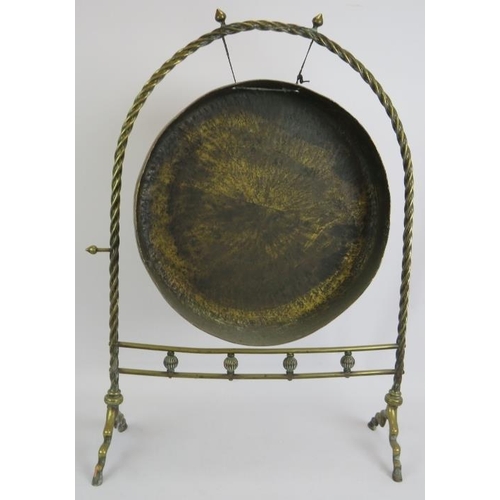 159 - A large antique bass gong on barley twist stand. Height 76cm. Gong diameter 40cm.
Condition report: ... 