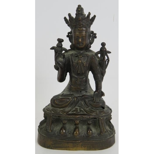 16 - A small antique Chinese bronze Deity figure, hollow cast. Height 17cm.
Condition report: Some histor... 