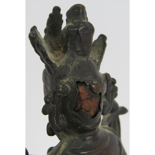 16 - A small antique Chinese bronze Deity figure, hollow cast. Height 17cm.
Condition report: Some histor... 