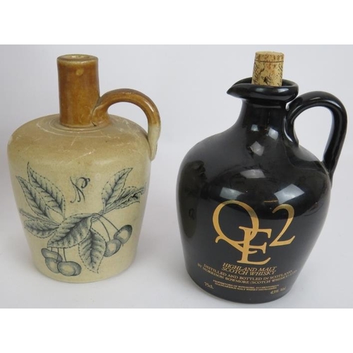 163 - A rare Doulton Lambeth stoneware jug for John Coulter's Great Harry Scotch Whisky Chatham, a stonewa... 