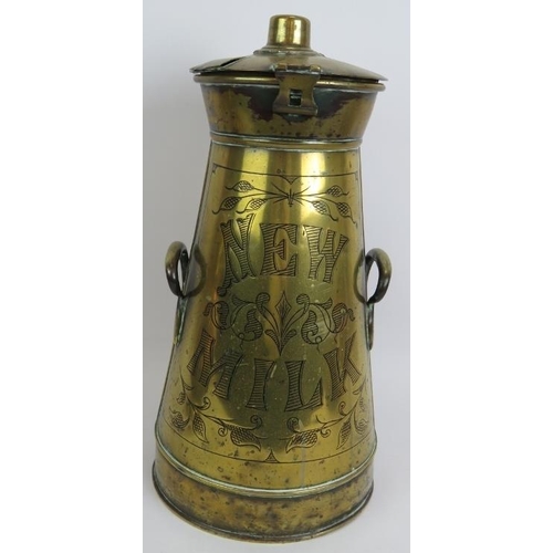 165 - An antique engraved brass 'New Milk' churn, a copper and brass jug and two copper kettles. Tallest 4... 