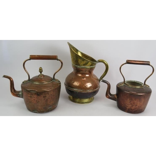 165 - An antique engraved brass 'New Milk' churn, a copper and brass jug and two copper kettles. Tallest 4... 