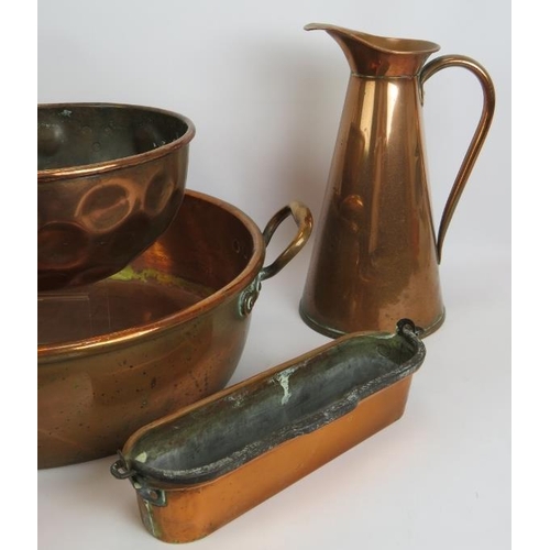 166 - A large antique copper pan, copper bowl, 3 copper jugs, funnel, cup and long pan. Largest pan 46cm d... 