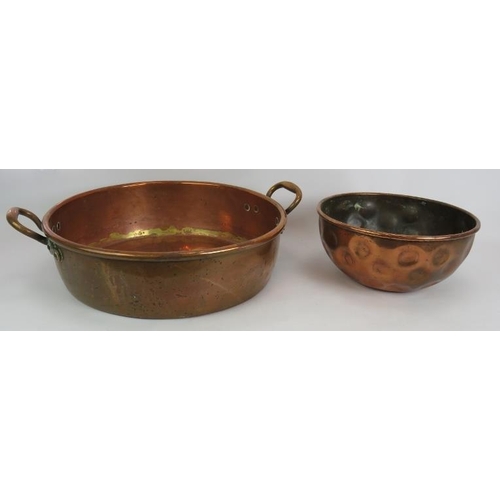 166 - A large antique copper pan, copper bowl, 3 copper jugs, funnel, cup and long pan. Largest pan 46cm d... 