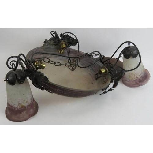 177 - A 1920s Art Nouveau plafonnier with three drop shades, by Verreries D'Art Lorrain. Wrought iron grap... 