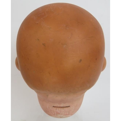 179 - A large antique Armand Marseille Bisque doll's head marked AM Germany 351/10 K and a composite doll'... 