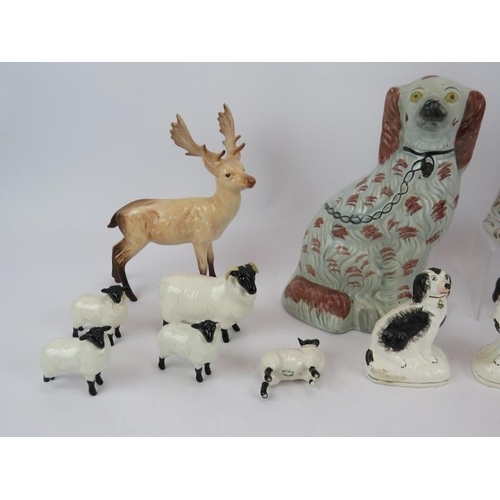 185 - Three continental porcelain figures including a pair of Sitzendorf figures, a Beswick stag and five ... 