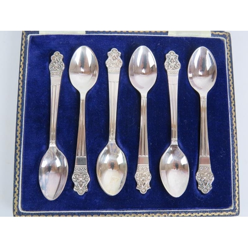 198 - A boxed set of six Waring & Gillow teaspoons, a boxed set of fish knives and forks with hallmarked s... 