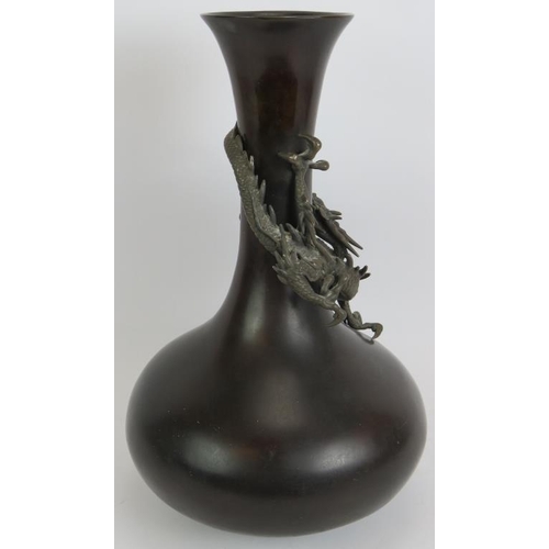 2 - A large bronze Japanese baluster vase with a finely modelled dragon. Late Meiji period. Height 39cm.... 