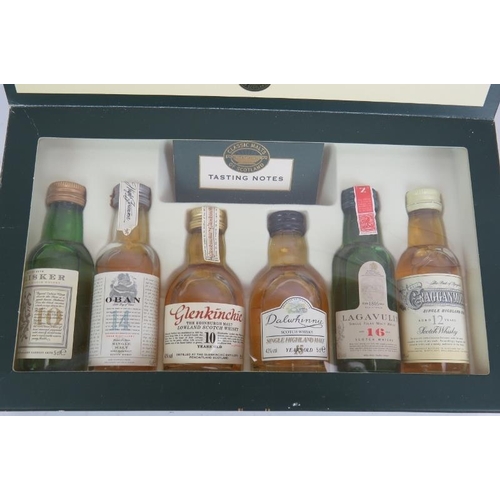 214 - A boxed set of 6 classic Scottish malt whisky miniatures (50ml), a litre bottle of Jim Bean Kentucky... 