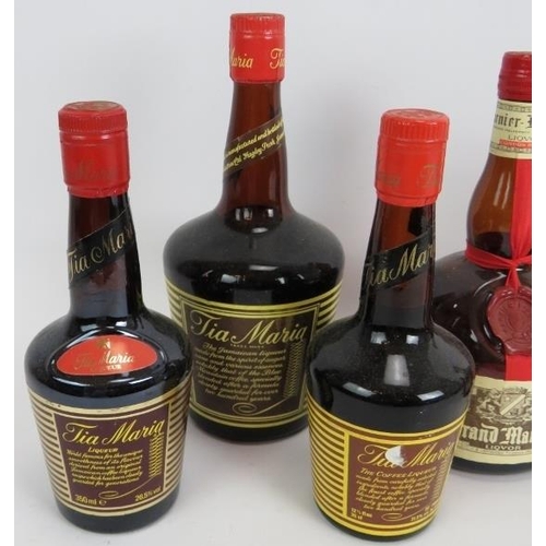 215 - Six bottles of liqueurs to include 3 bottles of Tia Maria and one each of Cointreau, Drambuie and Gr... 