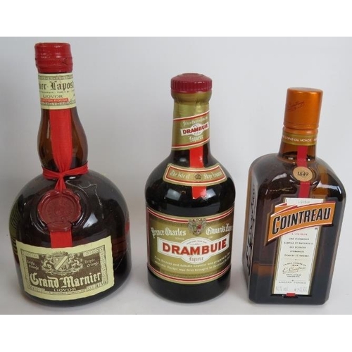 215 - Six bottles of liqueurs to include 3 bottles of Tia Maria and one each of Cointreau, Drambuie and Gr... 