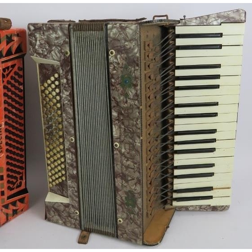 232 - Two vintage piano accordions, one Mazzini special with orange marbled body and one peretta. (2).
Con... 