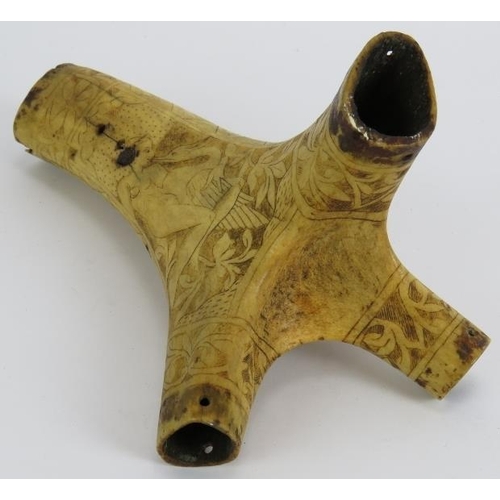 24 - A 16th/17th century scrimshaw decorated antler powder flask, probably German. Intricately carved wit... 