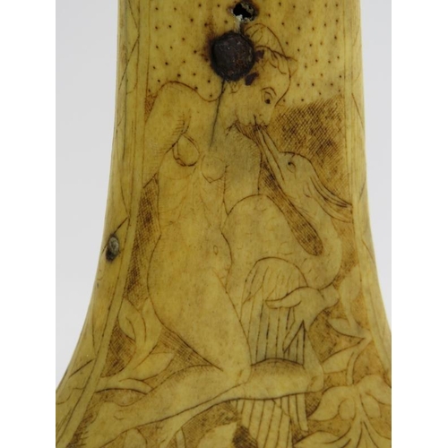 24 - A 16th/17th century scrimshaw decorated antler powder flask, probably German. Intricately carved wit... 