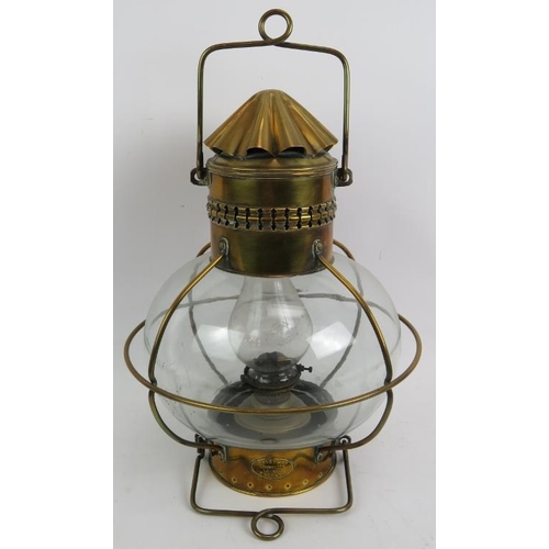 A brass ship's lantern oil lamp bearing Davey & Co plaque. Height 55cm ...