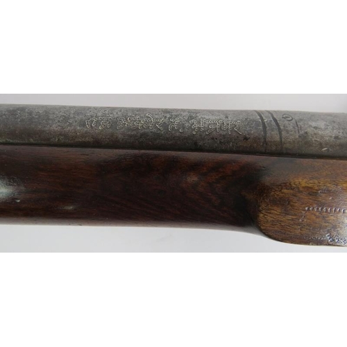 27 - A late 19th century 'Whitworth' style percussion rifle, Serial No 9011 with chased Indian markings t... 