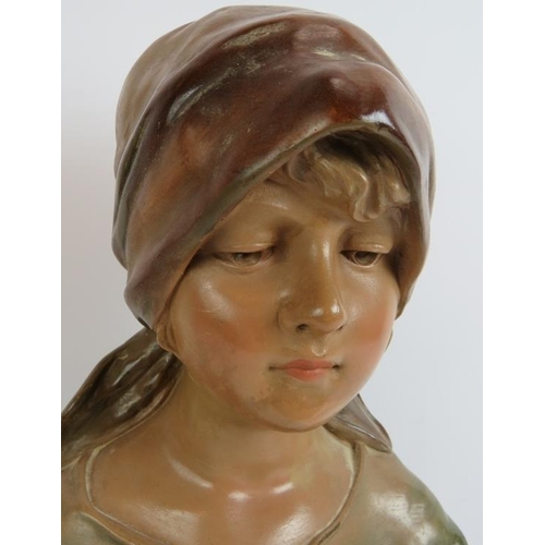 28 - An early 20th century Art Nouveau plaster bust of a young girl numbered 232 to reverse. Height 33cm.... 