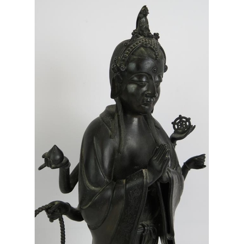 3 - An antique Chinese bronze figure of a Deity, probably the Buddhist Goddess Marici, with Chinese scri... 